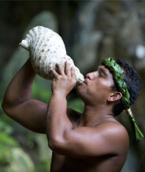 A local man with a shell