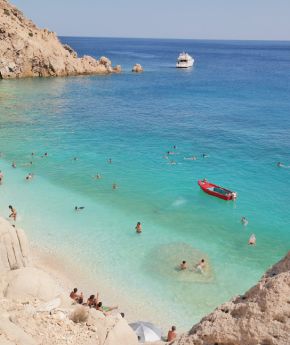 Enjoy the stunning scenery of a beach in Ikaria with turquoise waters