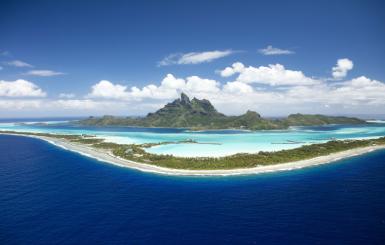 Aerial photo of a tropical island with turquoise waters