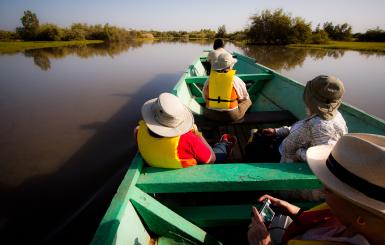 Tourists being transfered in a traditional boat