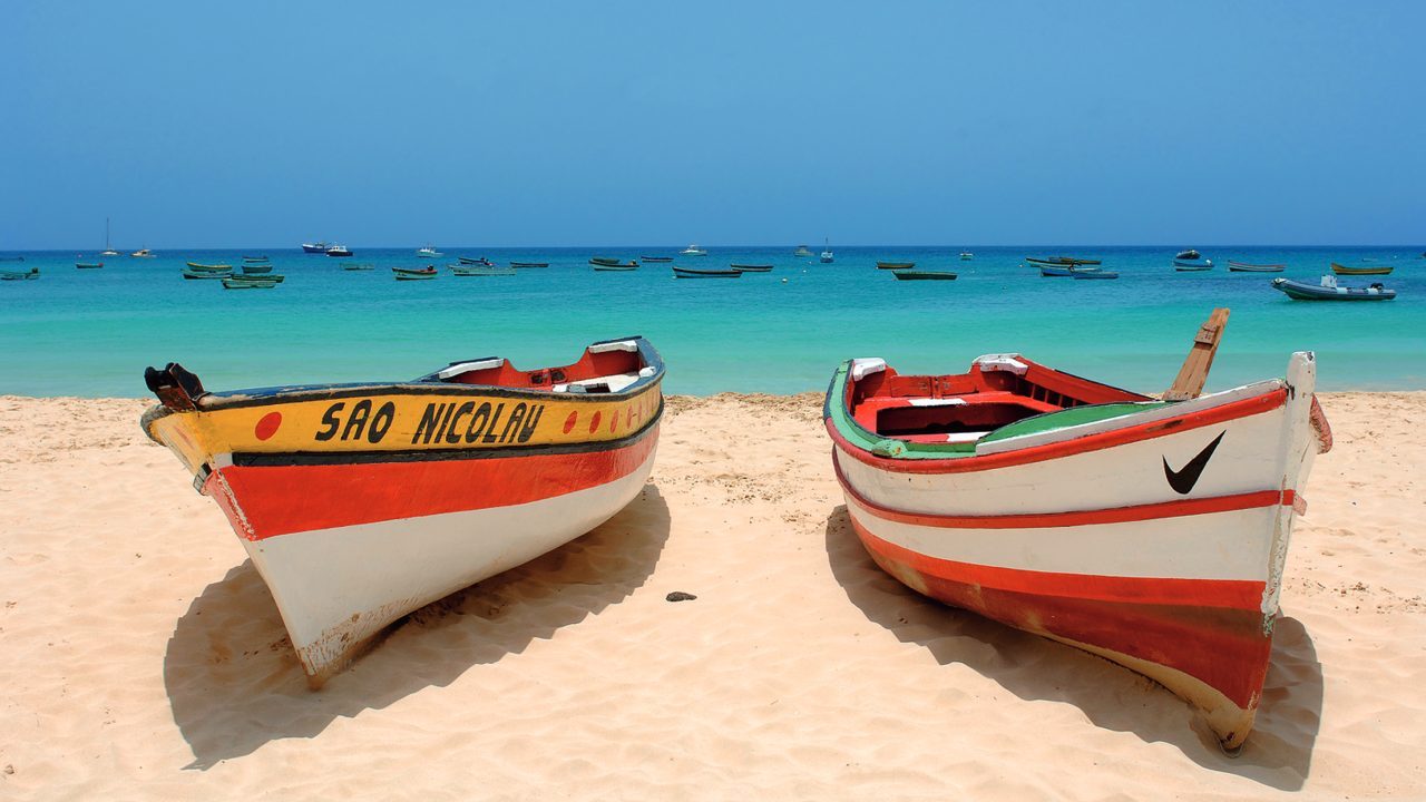 Wooden red boats in the beach of Cape Verde, in West Africa