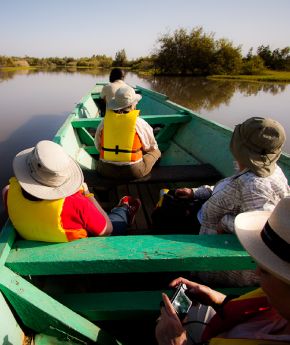 A group of tourists tranfered with local boat