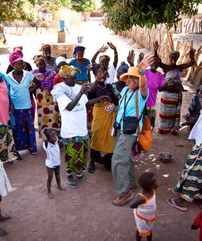 A tourist dancing with the locals