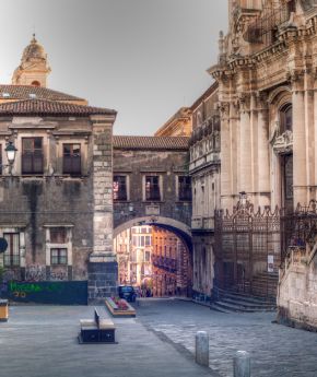 A view of the historic Via dei Crociferi and San Benedetto arch in Catania, Italy