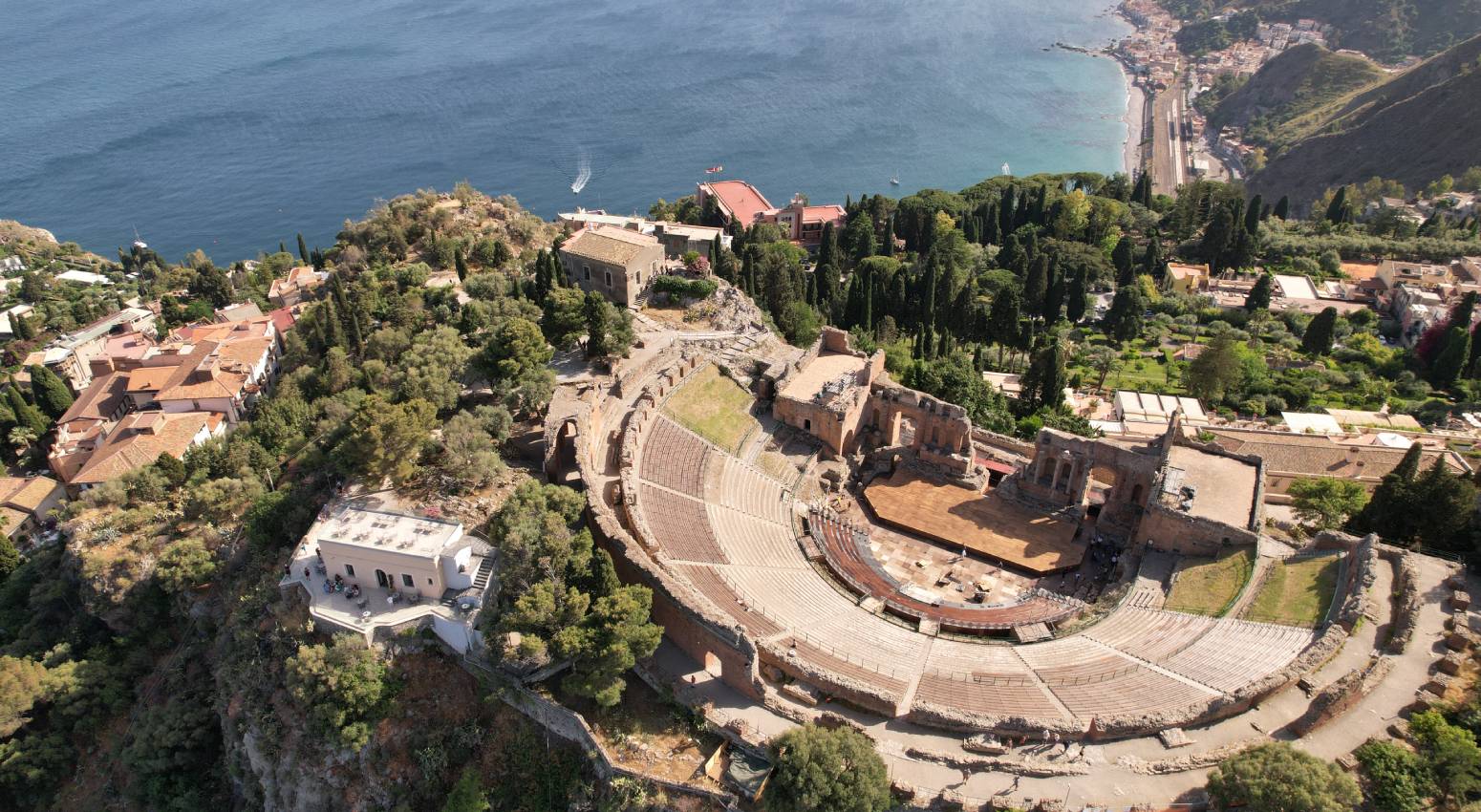 Aerial view to an ancient theatre next to the sea