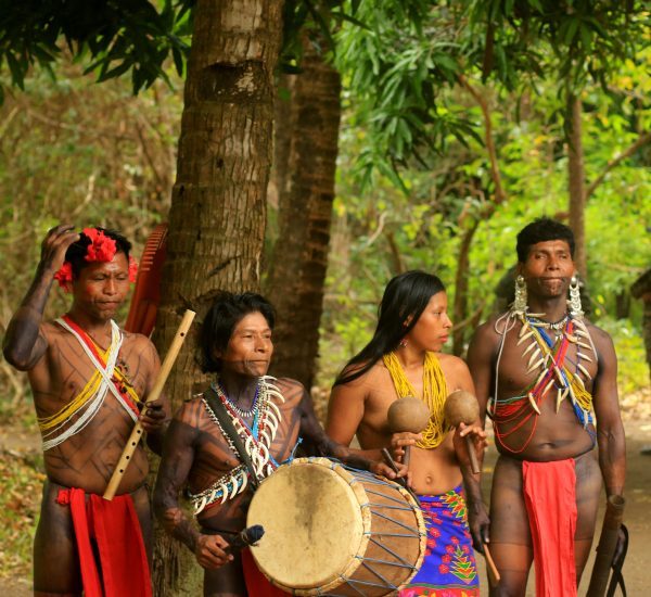Local people dressed in traditional clothing and playing music