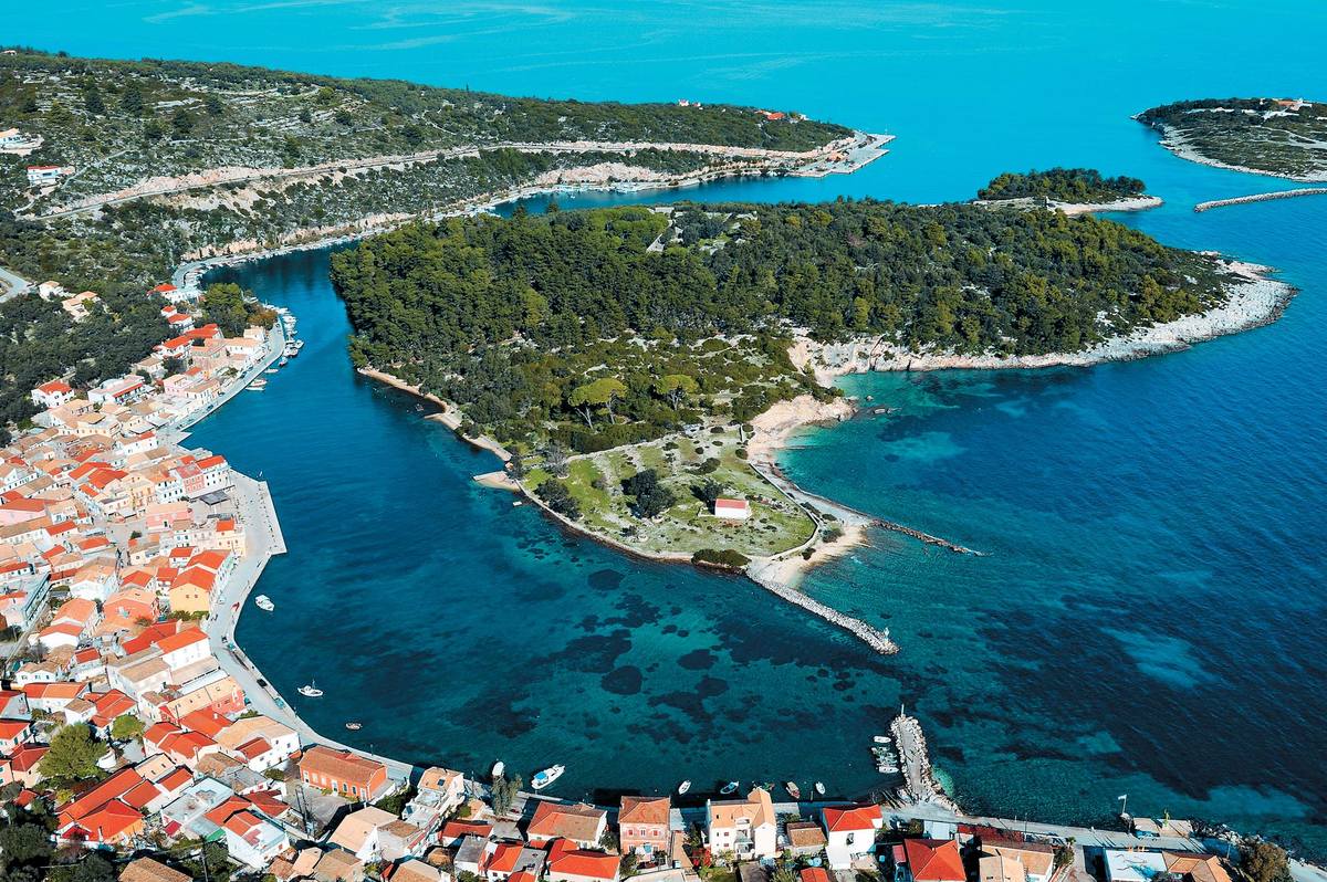 Aerial view of port of Vathy with the grand canal in Gaios, capital city of Paxos Island, Greece