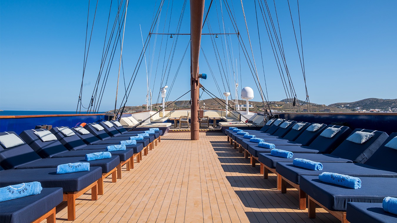 The deck area with sunbathing chairs