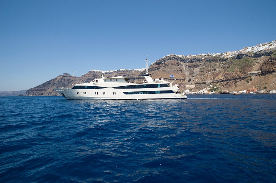 Harmony V ship sailing in Caldera of Santorini