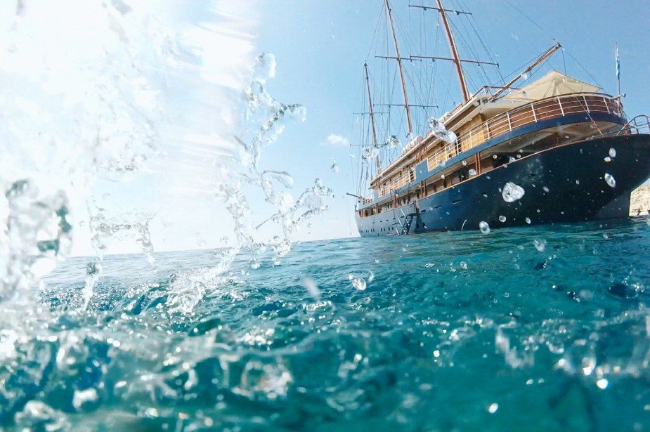 Holiday cruise boat sailing in Cyclades.