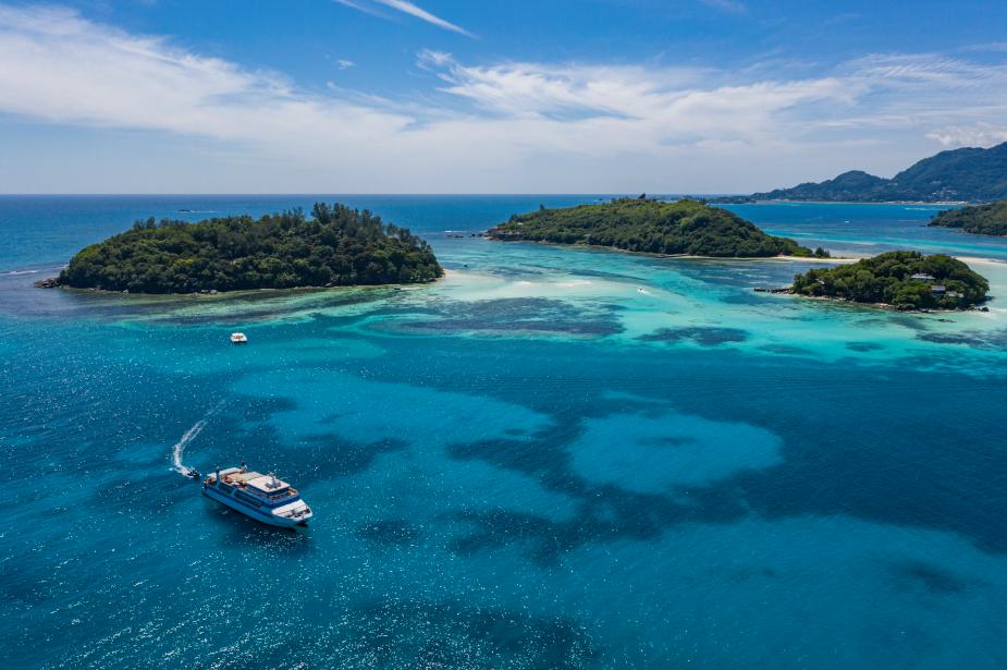 A yacht cruising in the clear blue waters of the Mediterranean