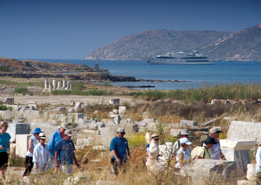 Tourists visiting archeological area in Delos island