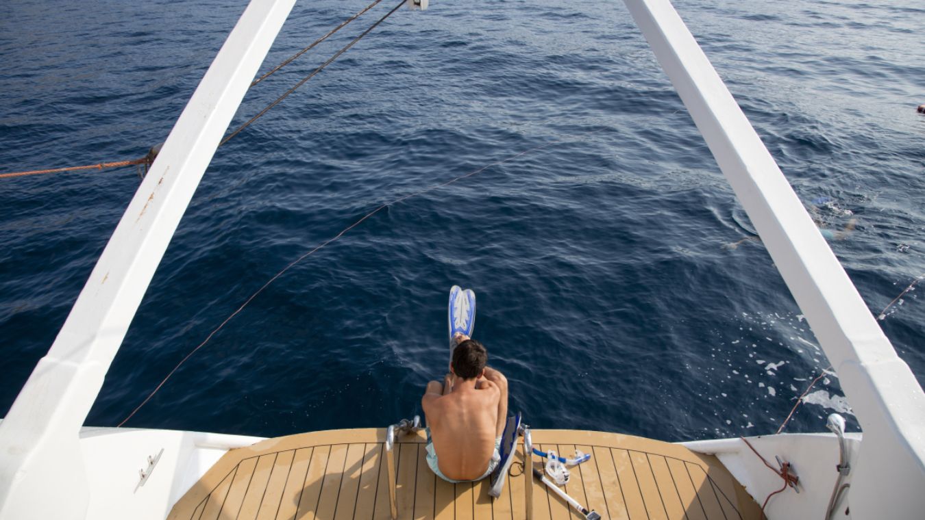 A man at the swimming platform on the Panorama II cruise ship