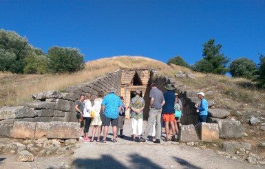 A Variety Cruises excursion group admiring the view from the Mykines island in Greece