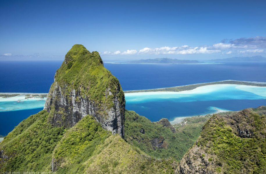 View to tropical island's mountain with turquoise waters in the background