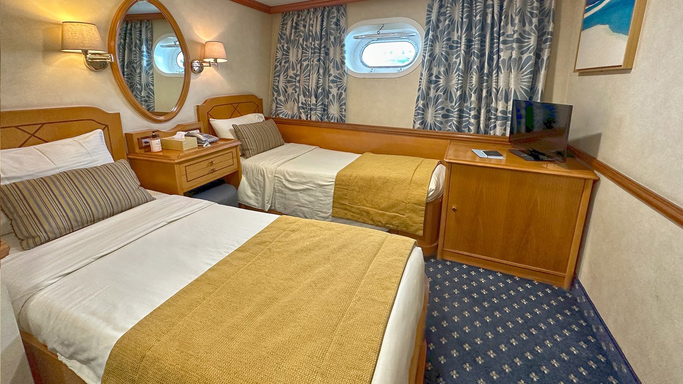 Inside the cabin with 3 beds