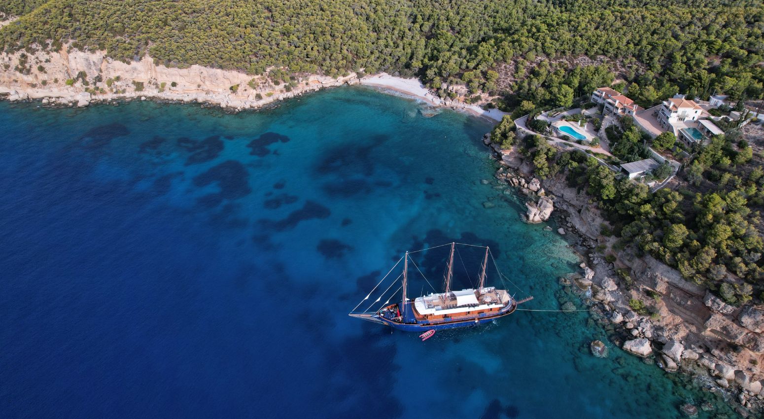 aerial view of a small ship at sea