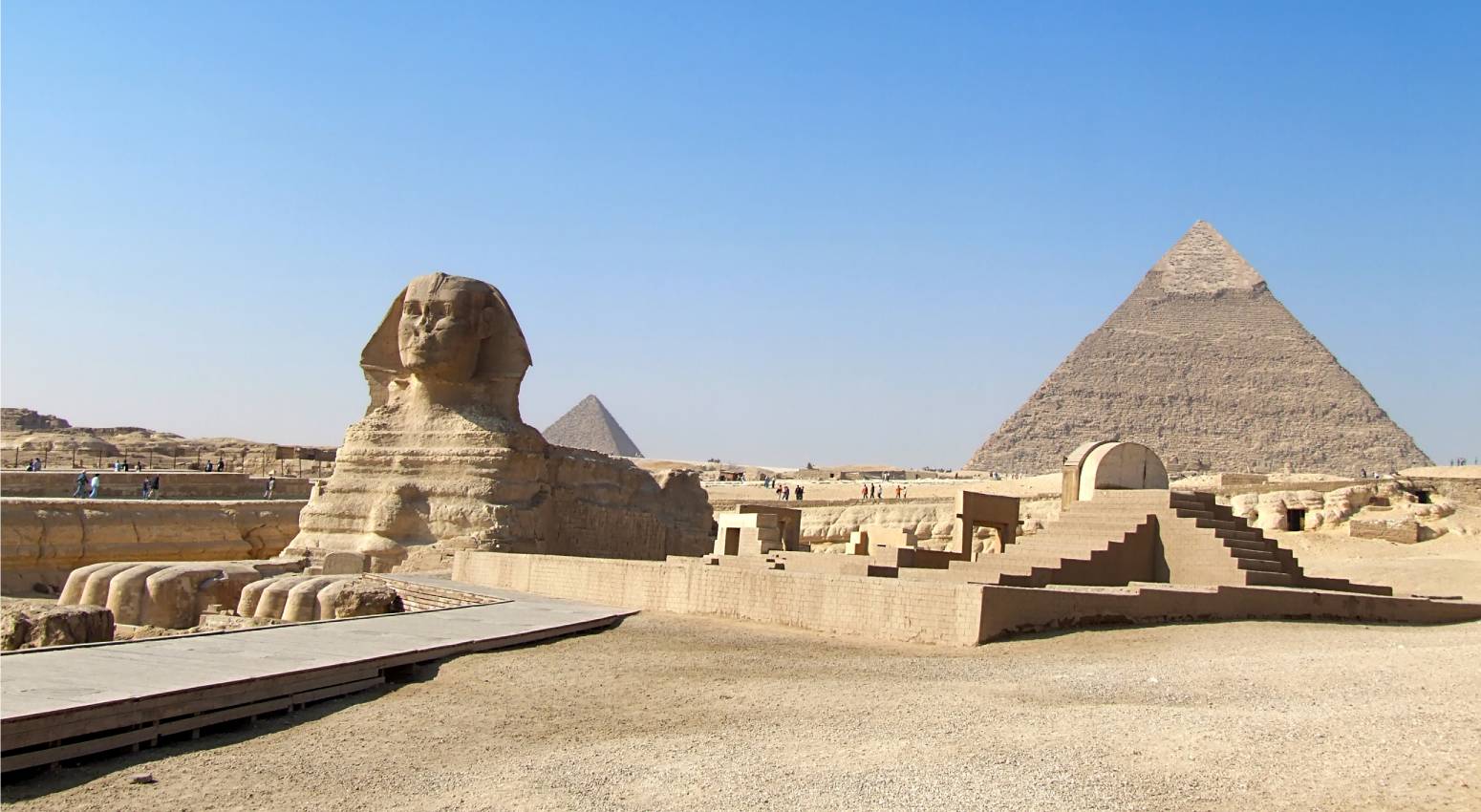The Great Sphinx in Giza, Egypt, with pyramids in the background