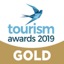 Tourism awards 2019 gold winner logo on a white background