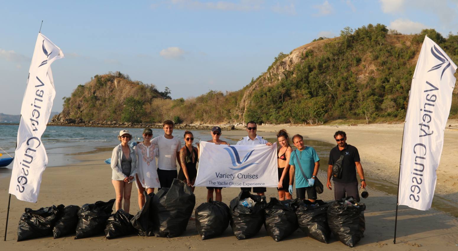 A group of people cleaning up a beach