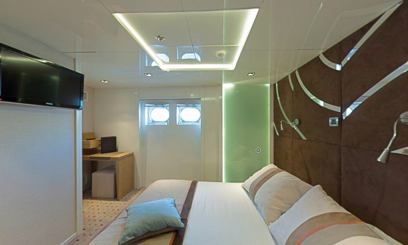 Voyager Yacht Cabin with Twin Beds and Large Windows