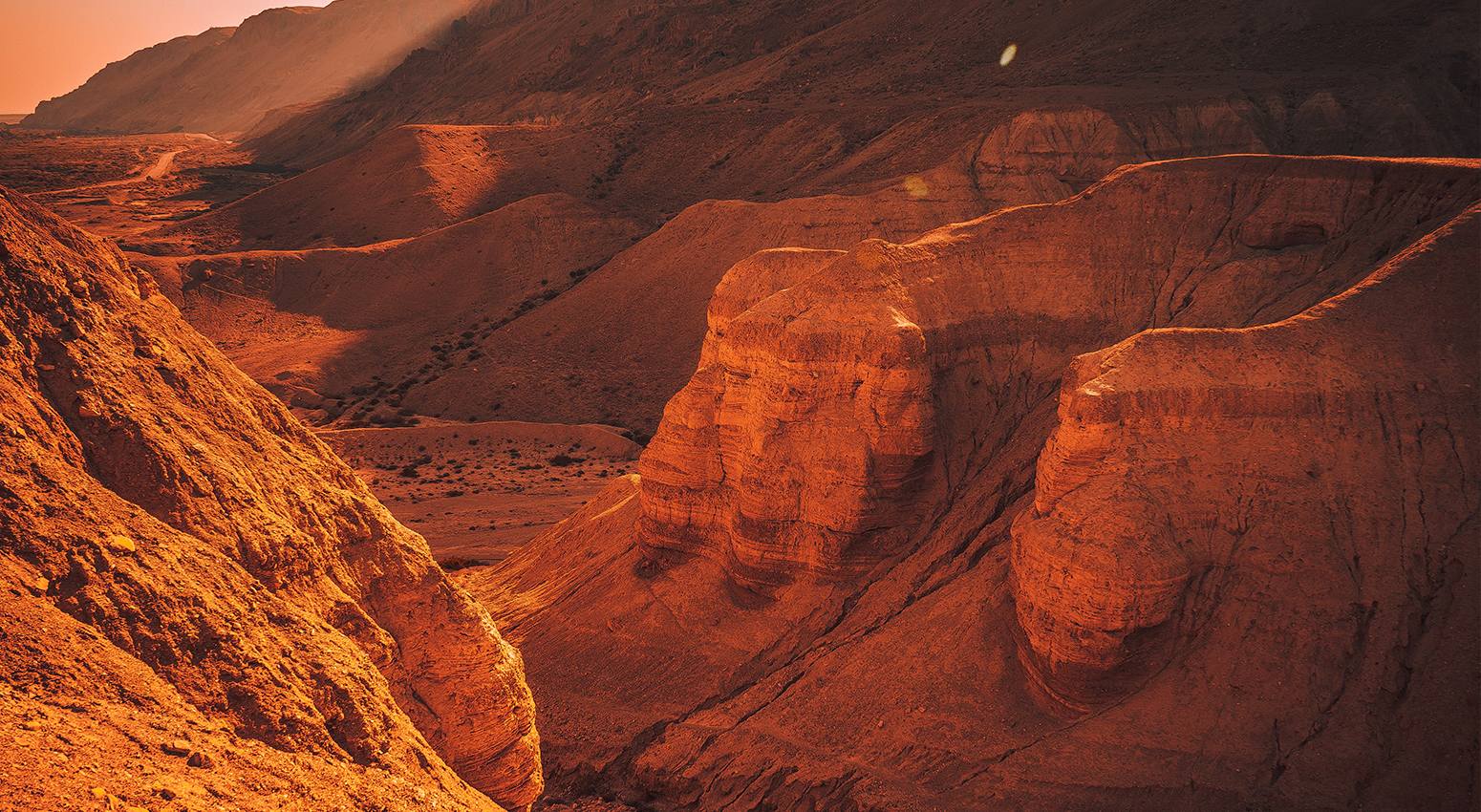 The landscape of Wadi Rum in Jordan with a Bedouin camp