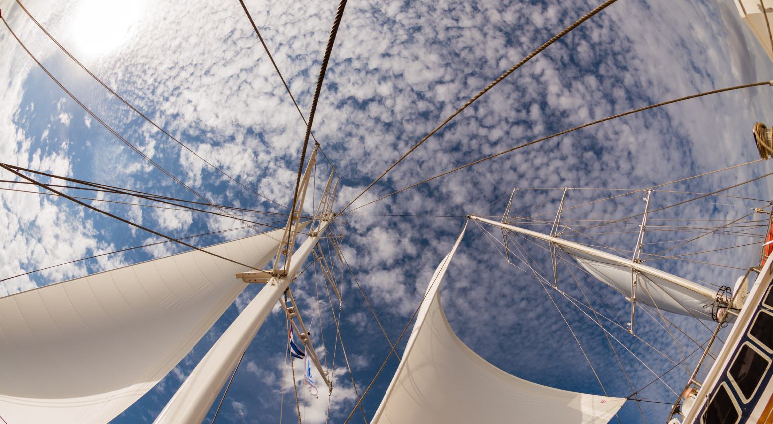 Sails of a holiday cruising ship.