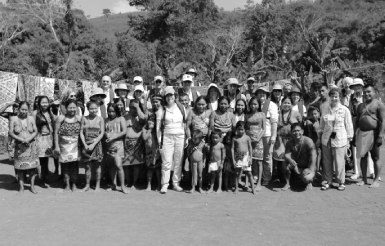 Photo with native people and Variety Cruises' tourists