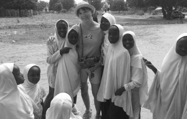 Tourist with girls from local school