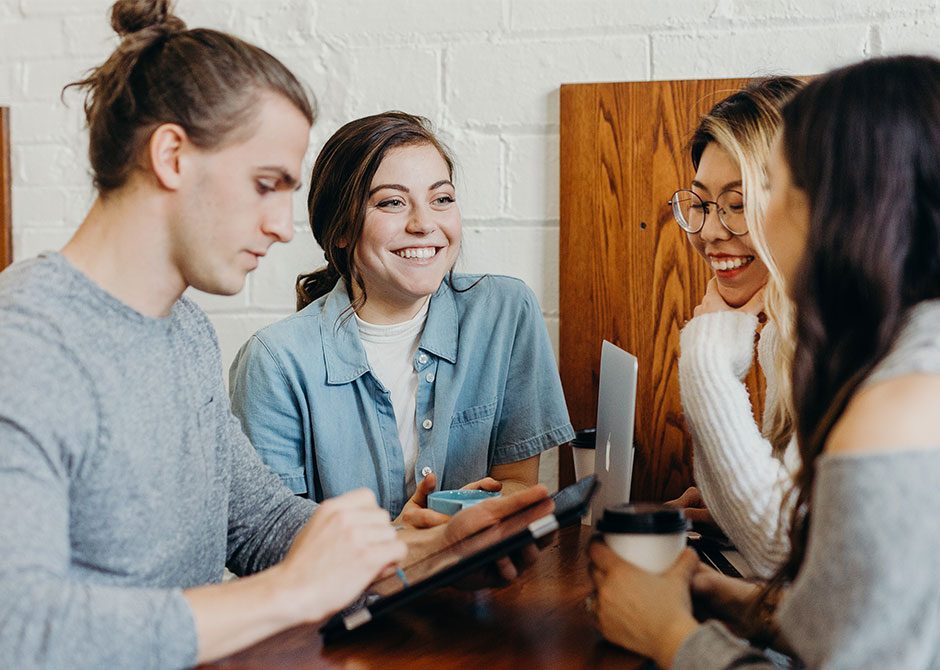 group of smilling people seaching for new job