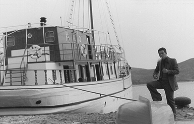 Black and white photo of a boat named "Lakis"