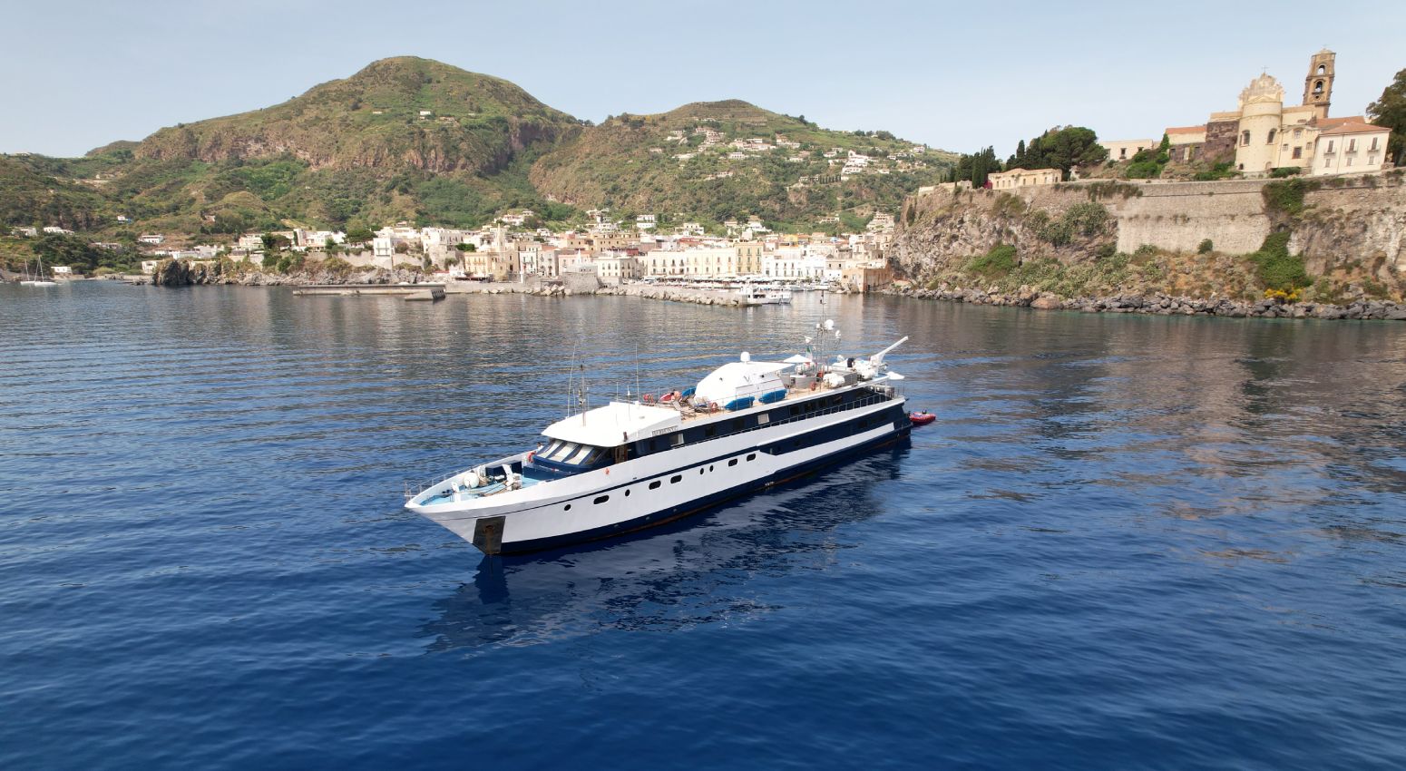 A docked small ship during a cruise.