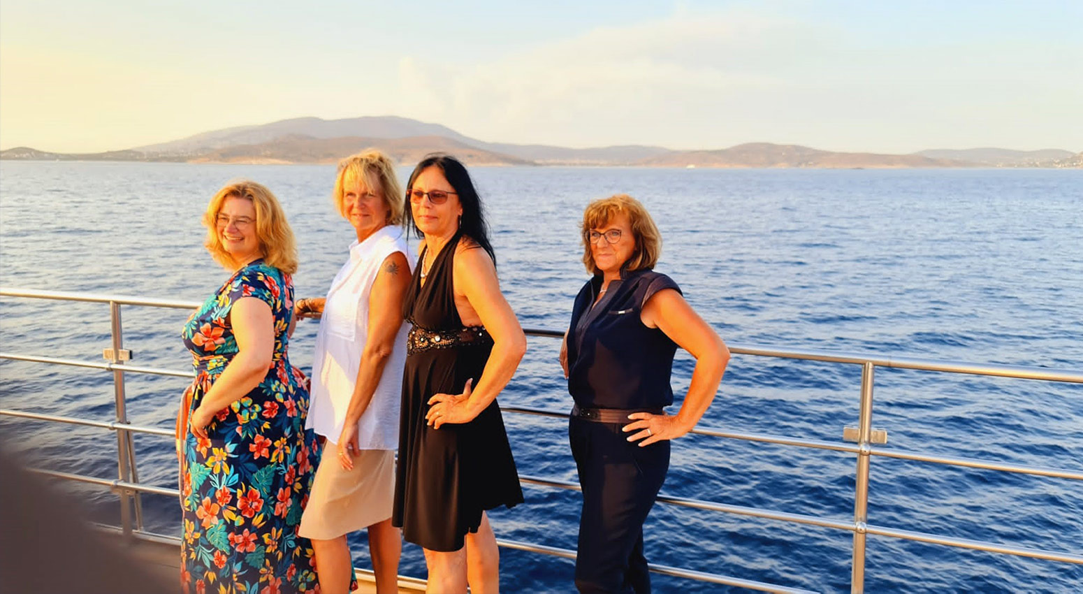 Tourists taking photos on the deck of a Variety Cruises' ship