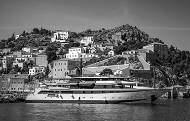 Voyager a Variety Cruises ship anchored in an island