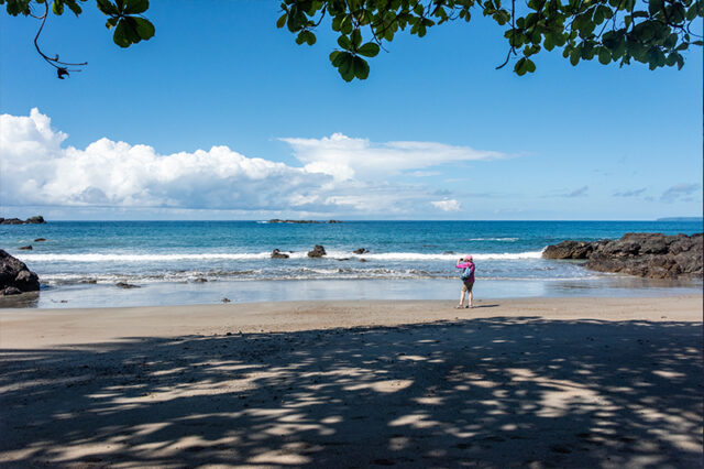 Sandy beach and crystal blue waters in Costa Rica