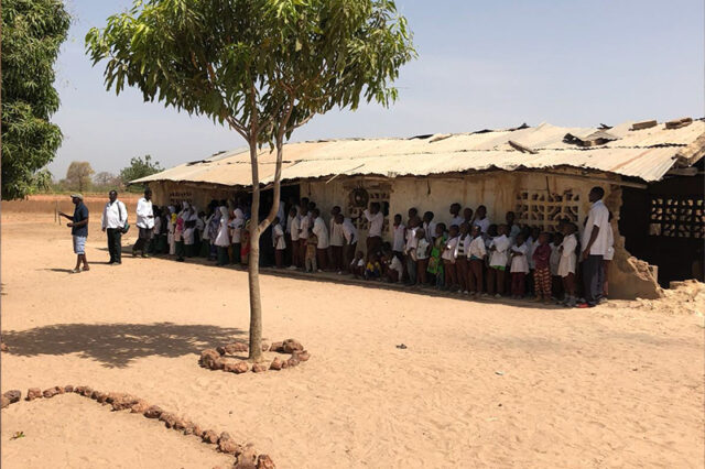 Outdoor shot of the Lamin Koto School in Kuntaur village, Gambia
