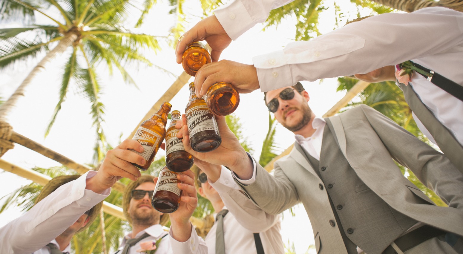Group of guys in a bachelor party drinking beer
