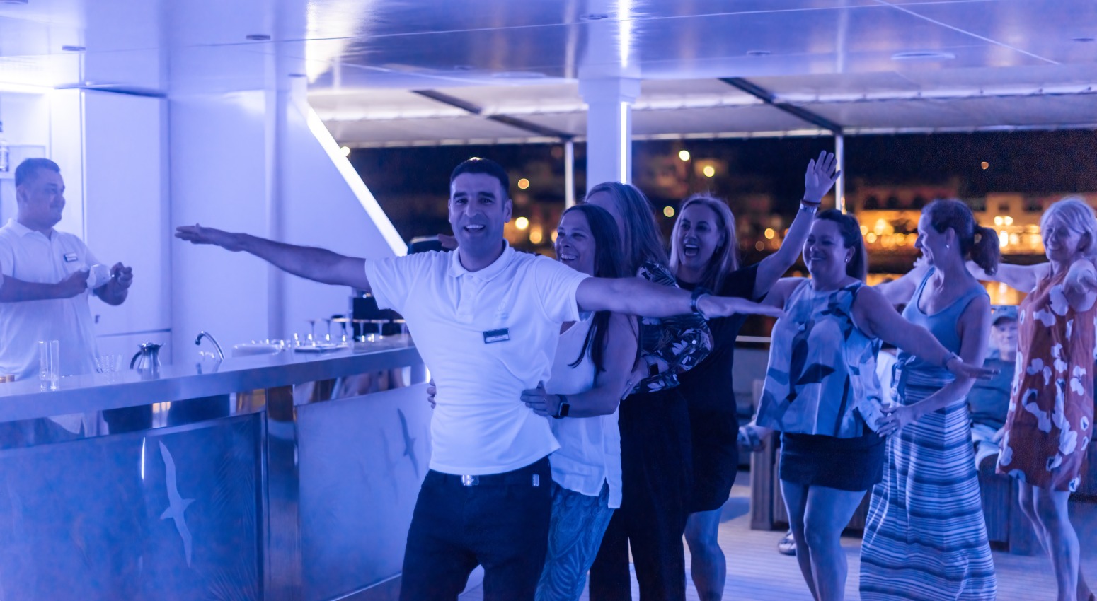 People having fun on a cruise ship deck