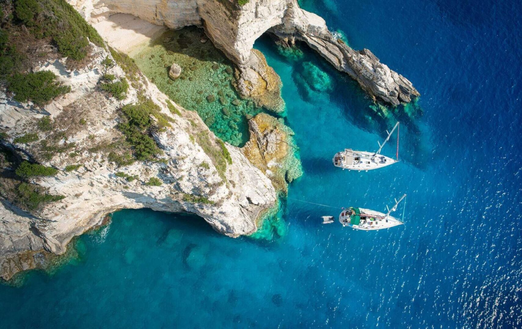 Sailing ships anchored in Ionian sea of Greece